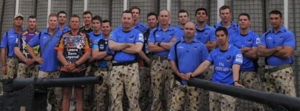 Tim Griggs and his team in the military