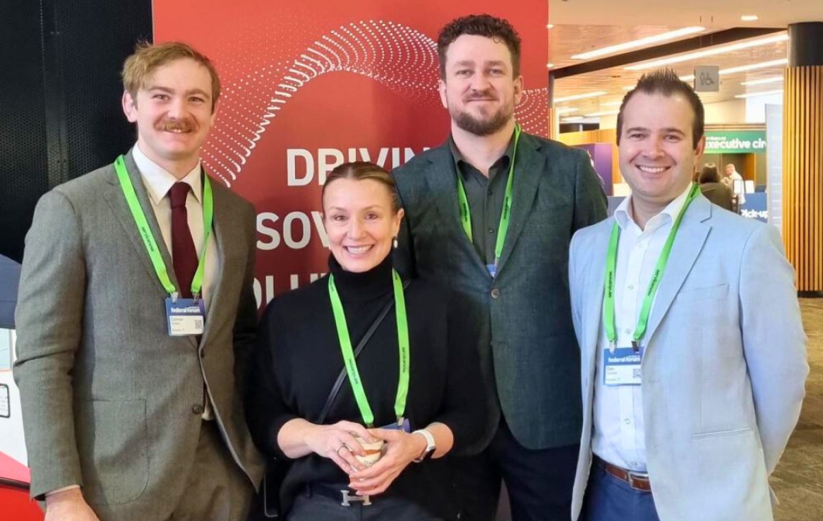 Kinetic IT team members at an industry event